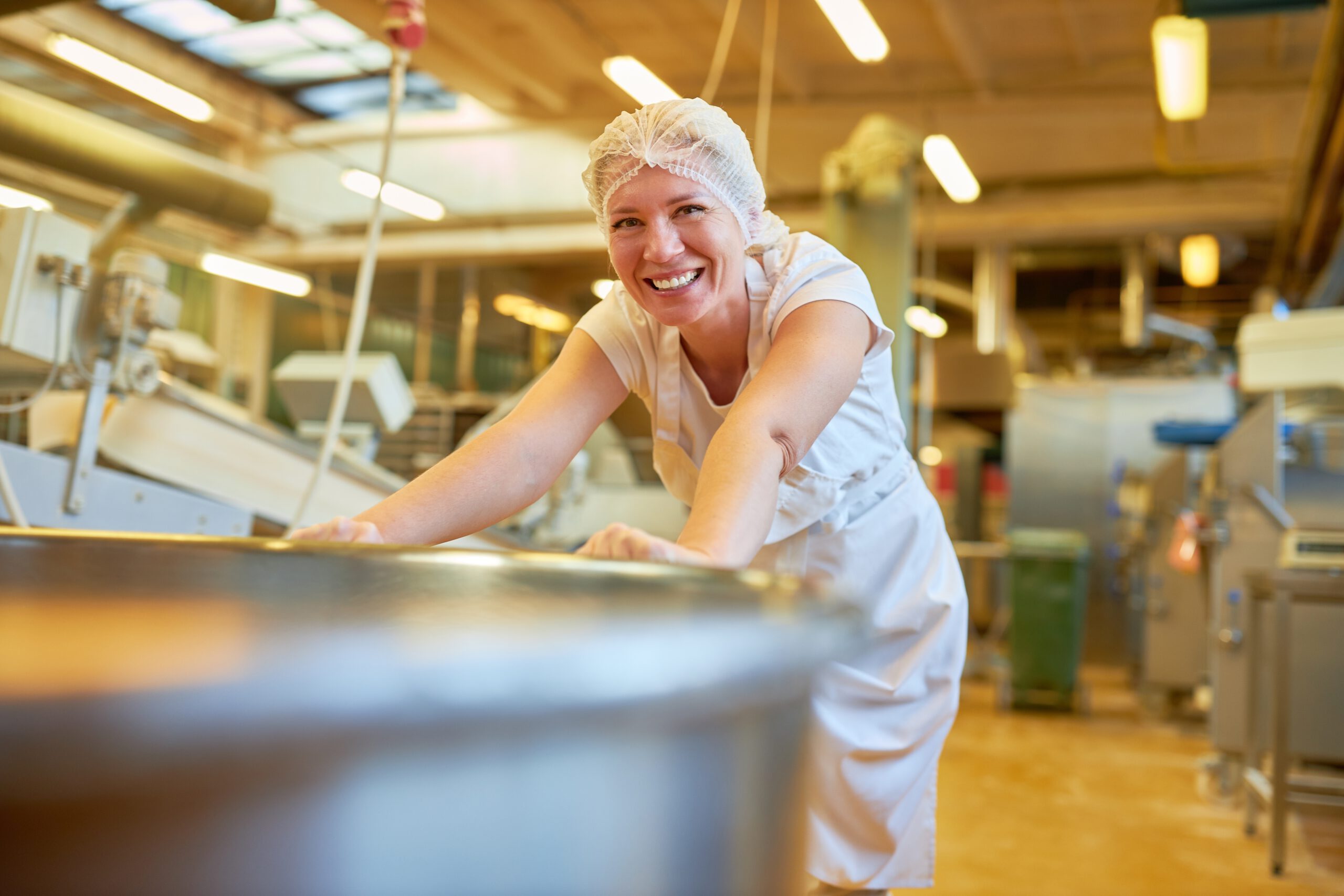 Young,Woman,As,A,Baker’s,Apprentice,Pushes,A,Cauldron,Or